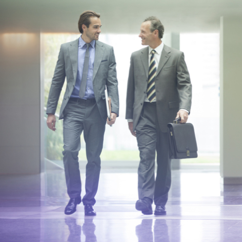 men in suits walking