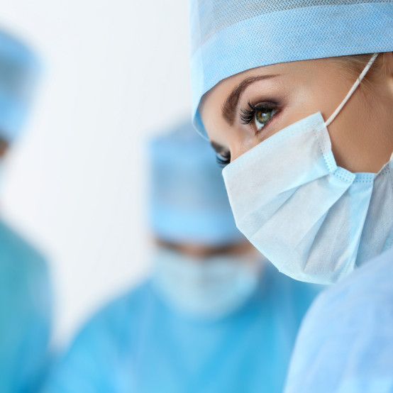 a close-up of a doctor wearing a mask