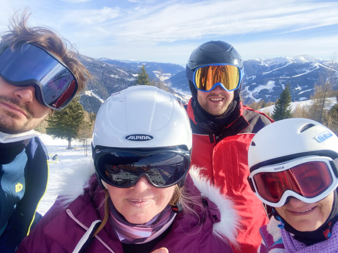 a group of people wearing helmets and goggles