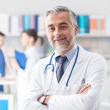 a doctor with his arms crossed