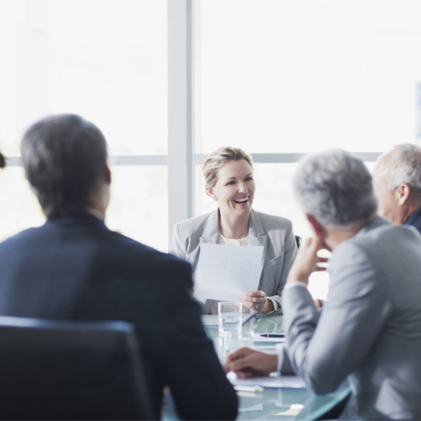 a group of people sitting at a table